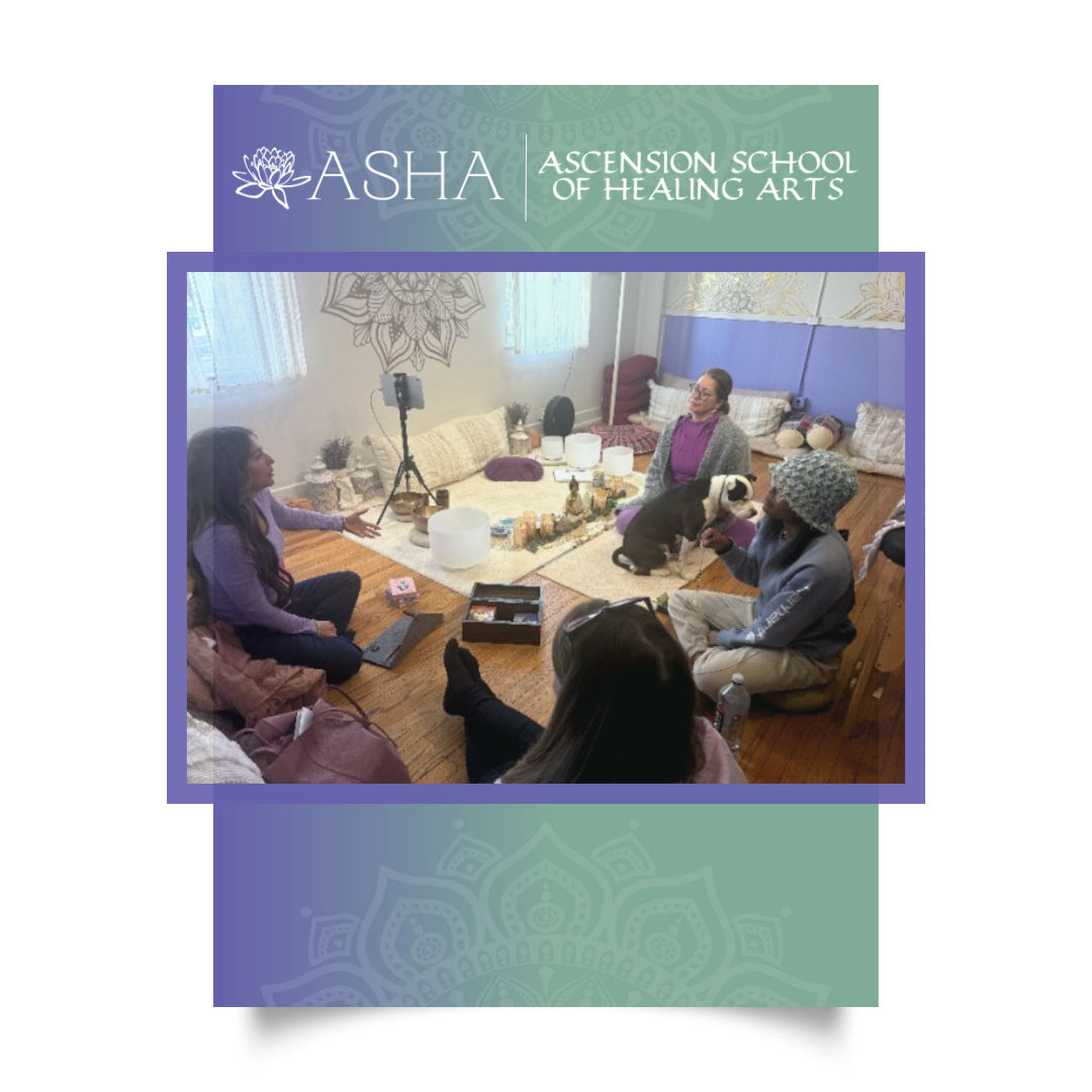 A sound bath circle seated on the floor around the instruments